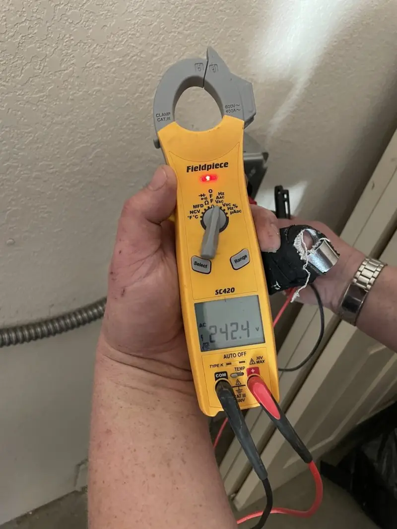 Voltage testing with clamp meter during Outlet Installation in Pittsgrove